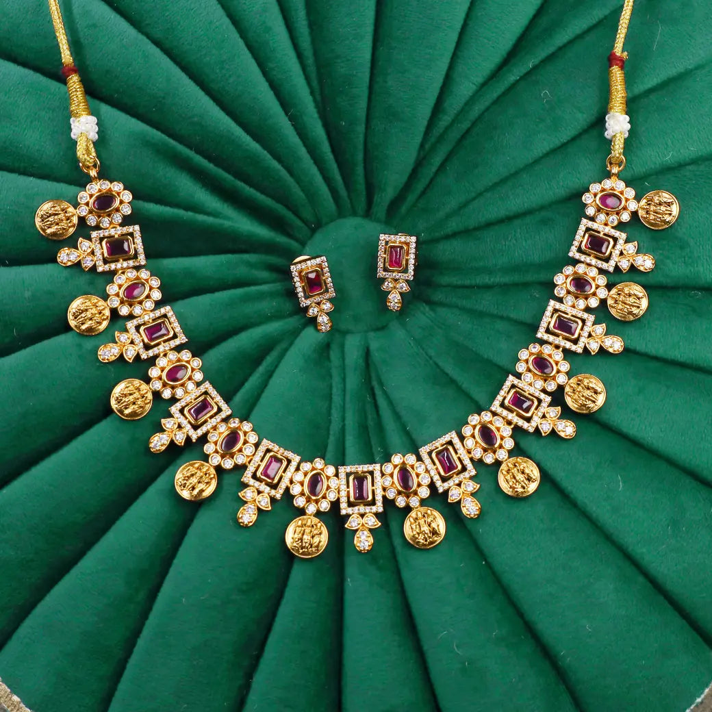 Coin necklace with ruby like stones