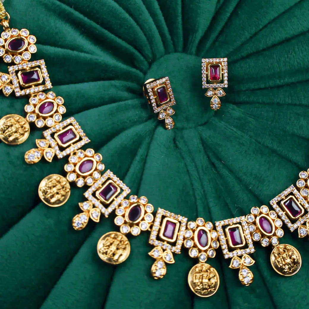 Coin necklace with ruby like stones