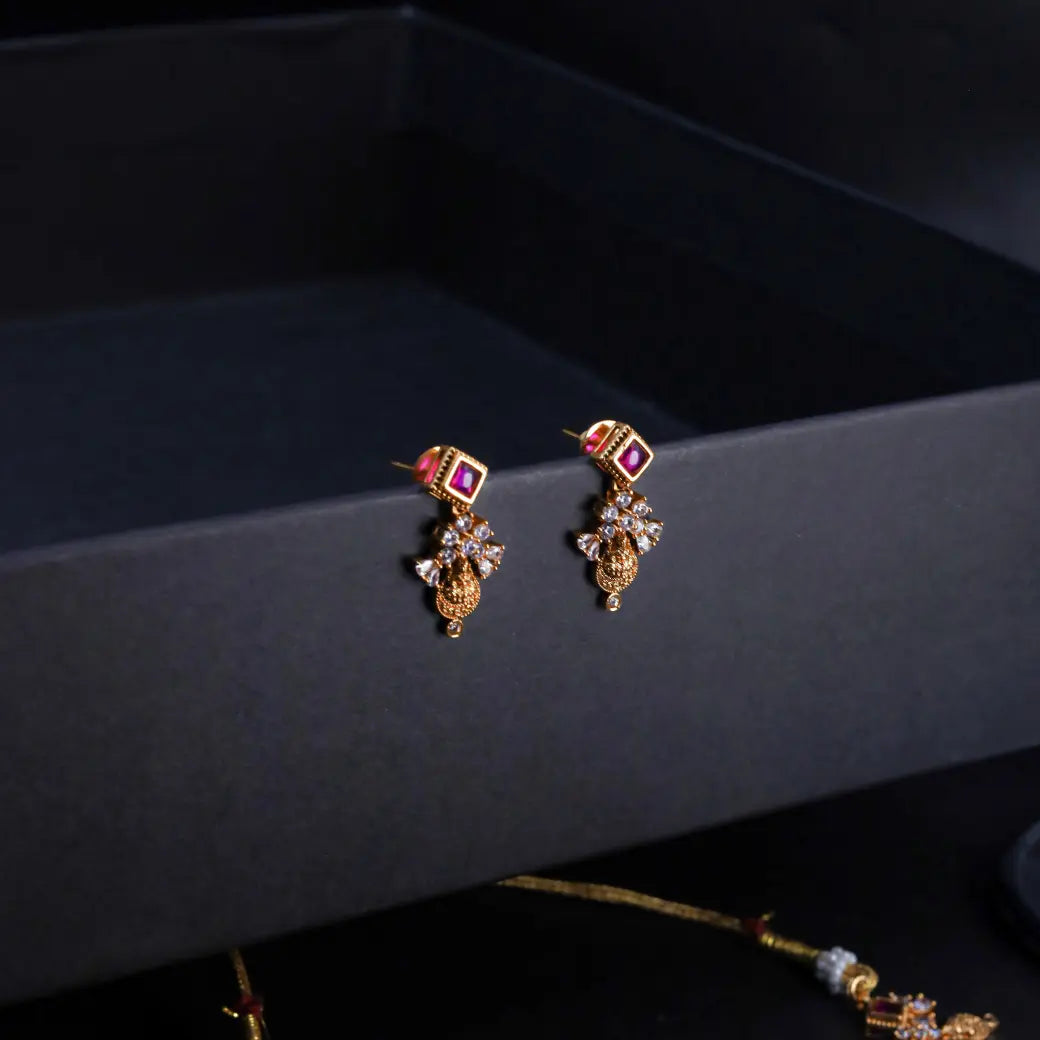 Antique necklace with white and ruby like stones