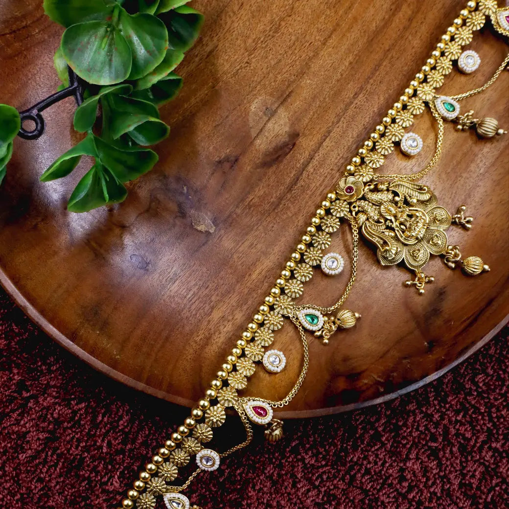 Antique hip belt with red and green stones
