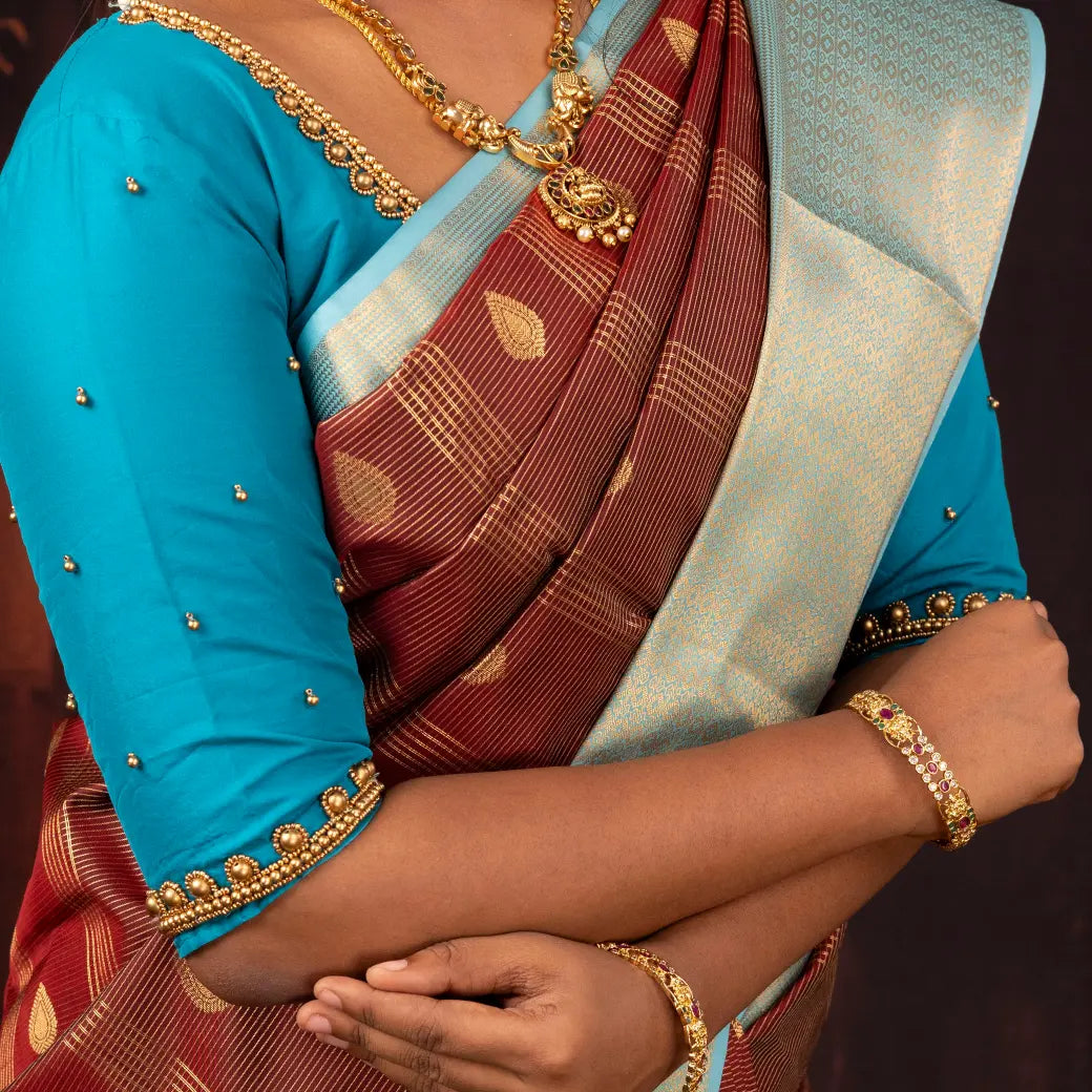 Maroon With Teal Blue Copper Zari Border Soft Silk Saree