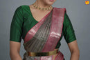 Grey with pink pure silk saree with woven lotus motifs in a raising pattern - Thenianantham