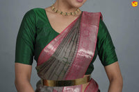 Grey with pink pure silk saree with woven lotus motifs in a raising pattern - Thenianantham