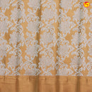Mustard Yellow with Green Pallu Floral Design in Silver Zari Kotta Tissue Saree