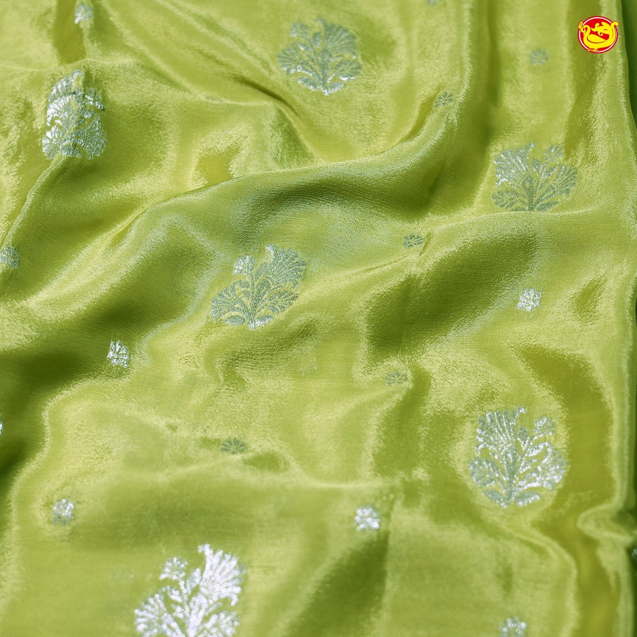 Mehandi Green Buttas Motifs Silver Zari Rich Pallu with Floral Border Georgette Saree - Thenianantham