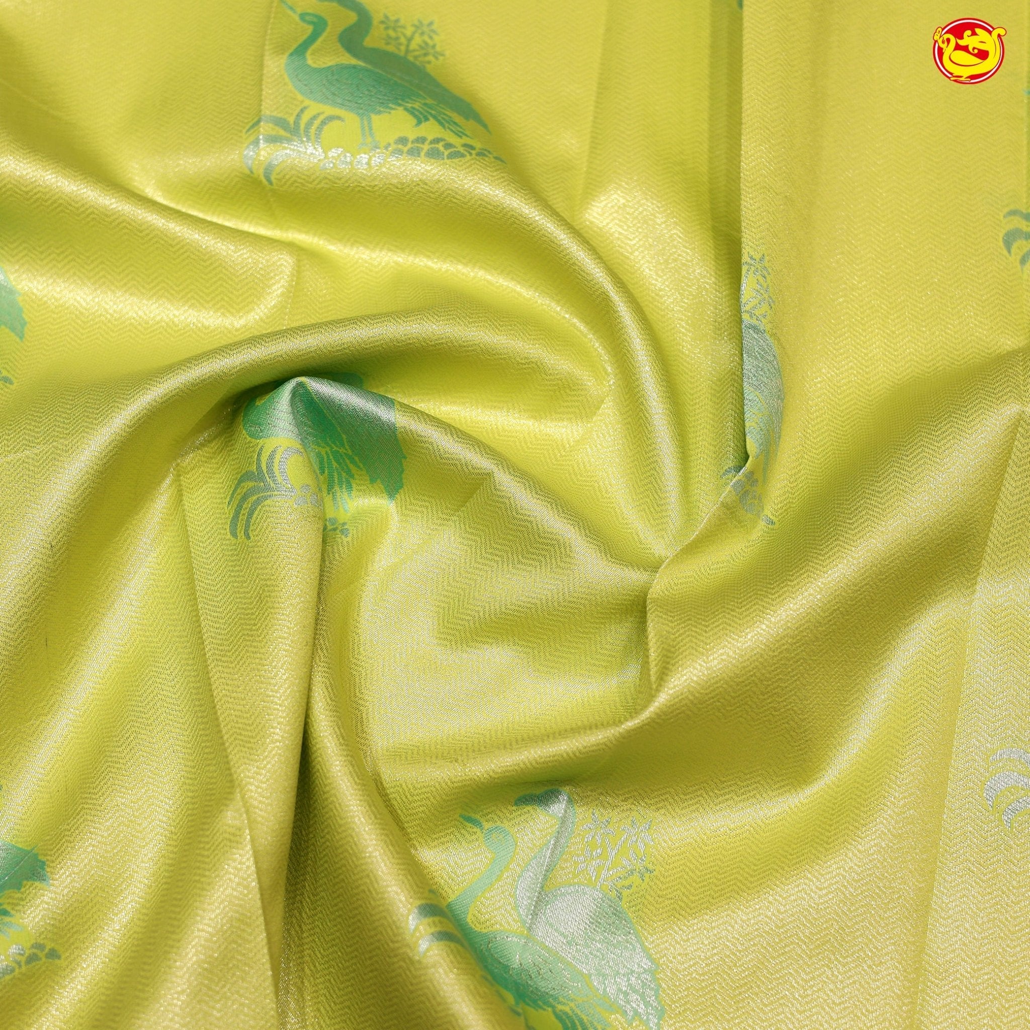 Pastel Green Flamingo Motifs Kubera Pattu Saree - Thenianantham