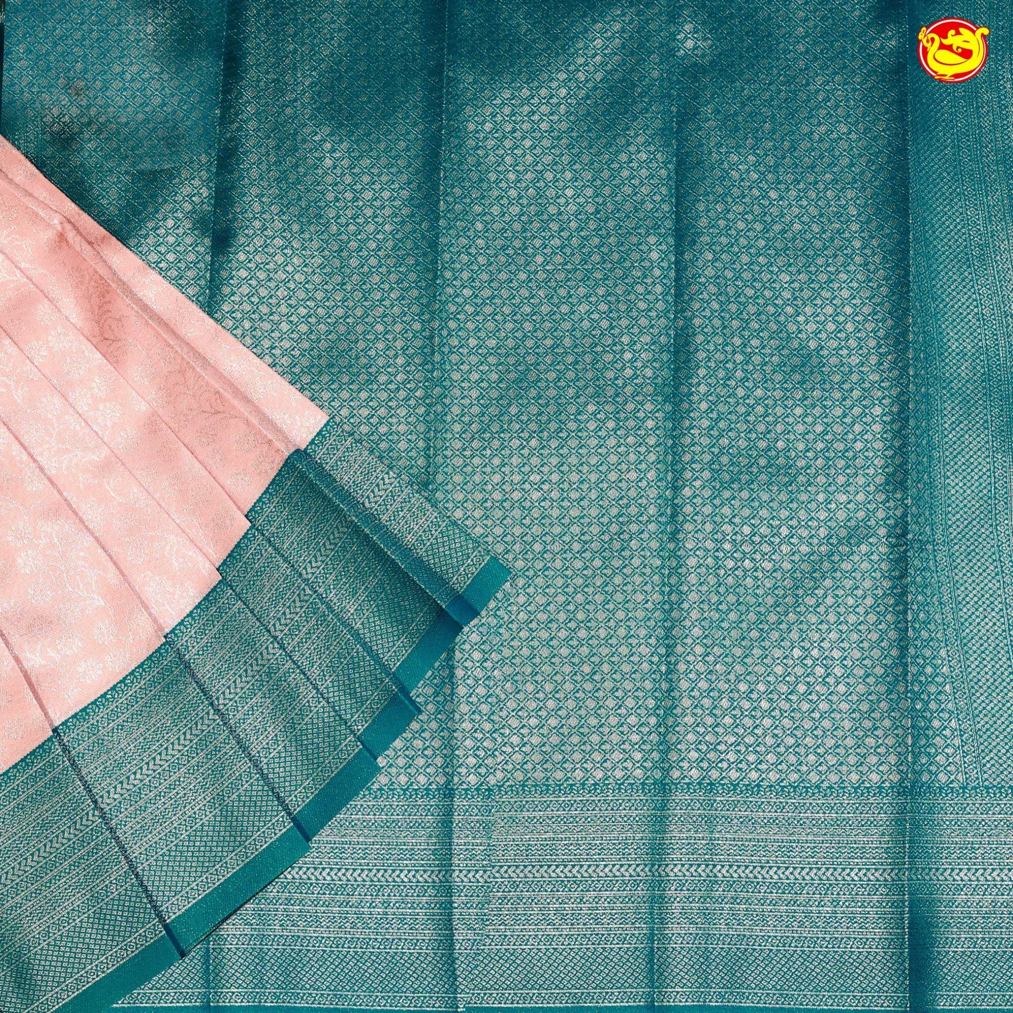 Peach with Peacock Blue Floral Motifs Kubera Pattu Saree