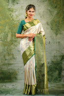 Beige Striped body with dark Green border Designer Silk Saree - Thenianantham