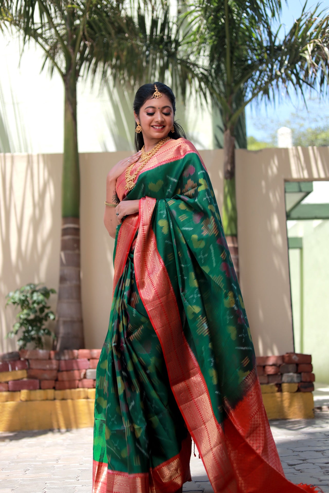 Bottle green with red ikat soft silk saree