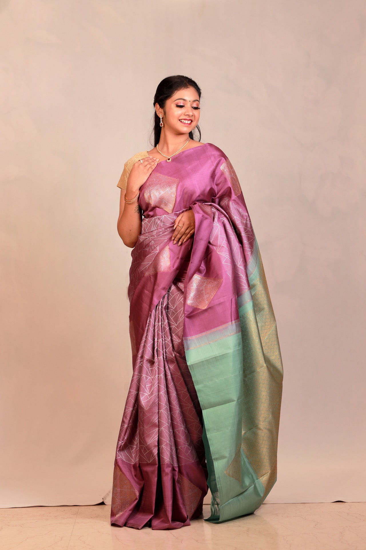 Lilac colour pure Kanchivaram silk saree with gold and silver zari