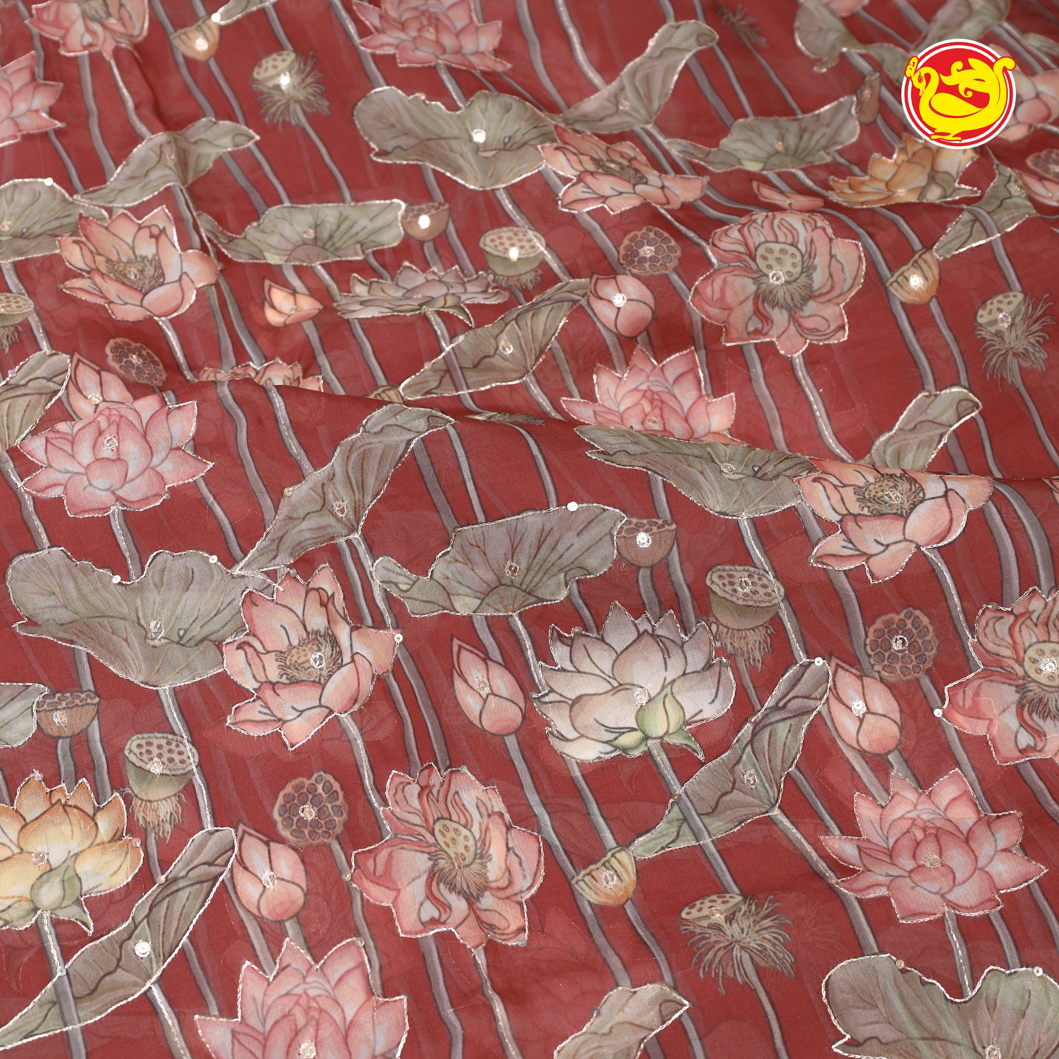 Dark beetroot pink pure organza saree with hand embroidery over digital prints