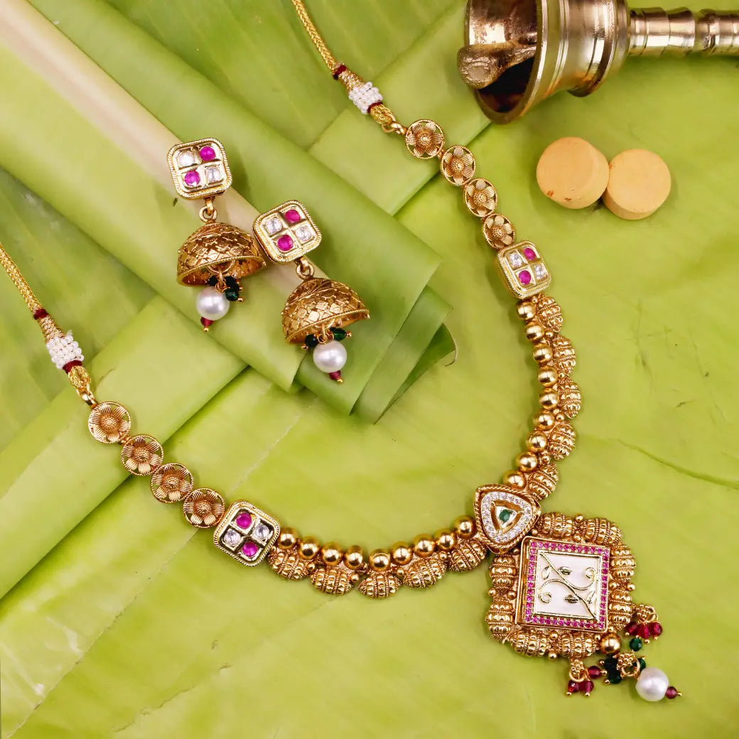 Polki Kundan necklace with matching jhumkas