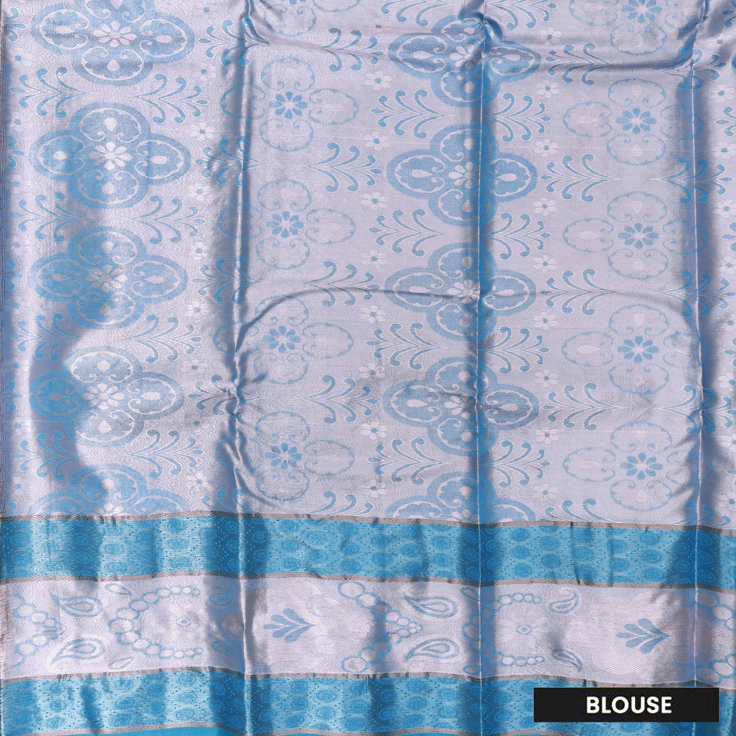 Light Pink with Blue Floral Design Tissue Silk Saree