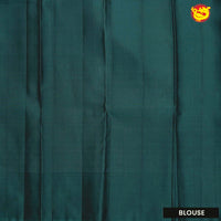 Grey with peacock green soft silk saree