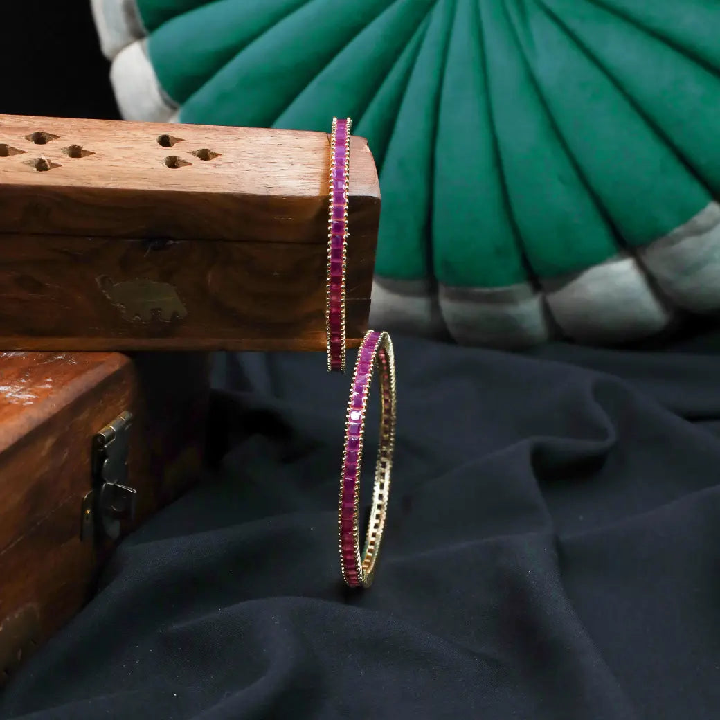 Bangles with ruby colour stones