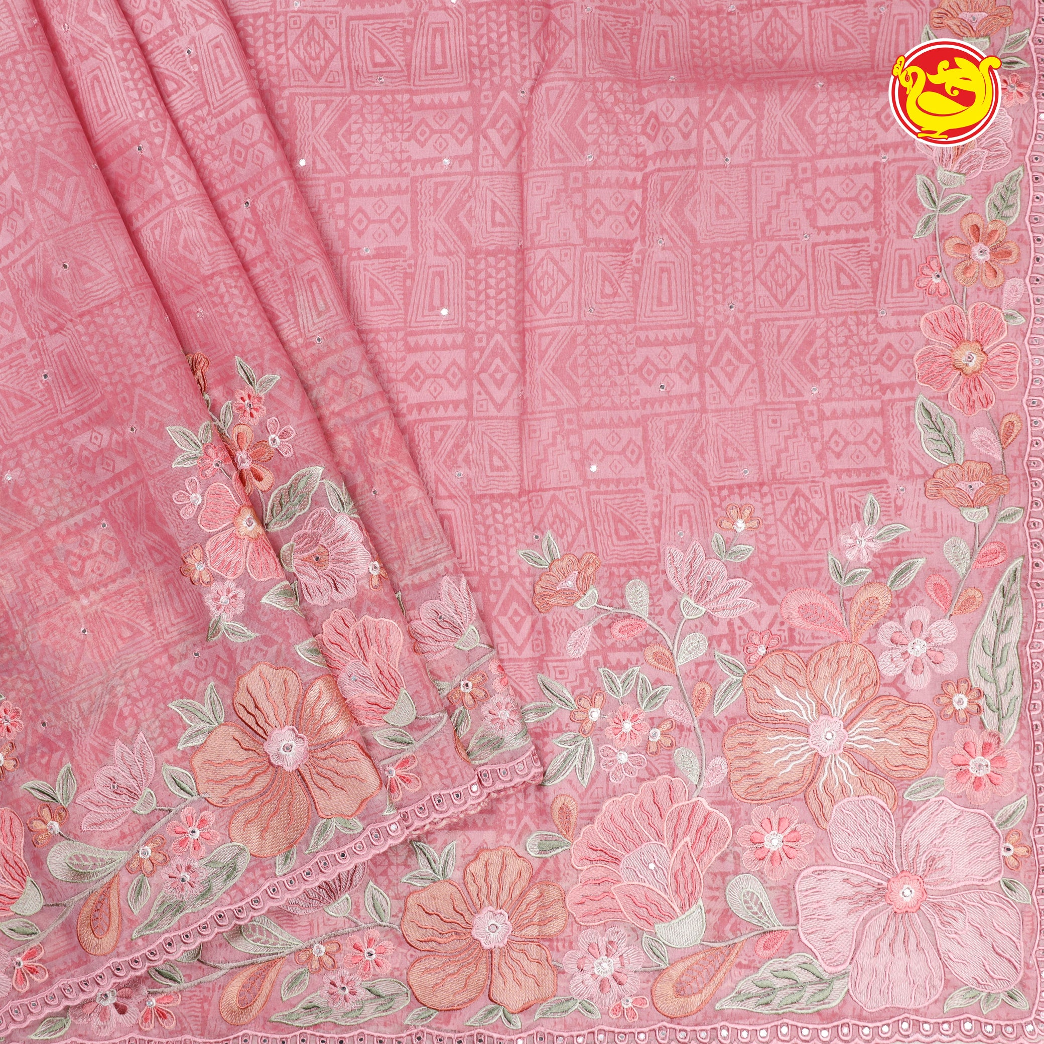 Pastel pink organza silk saree with embroidery and block prints