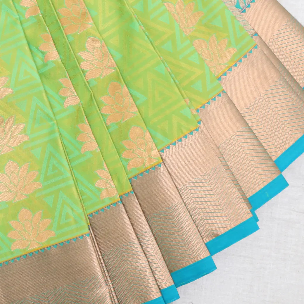 Vibrant Green with Blue Embossed Silk Saree