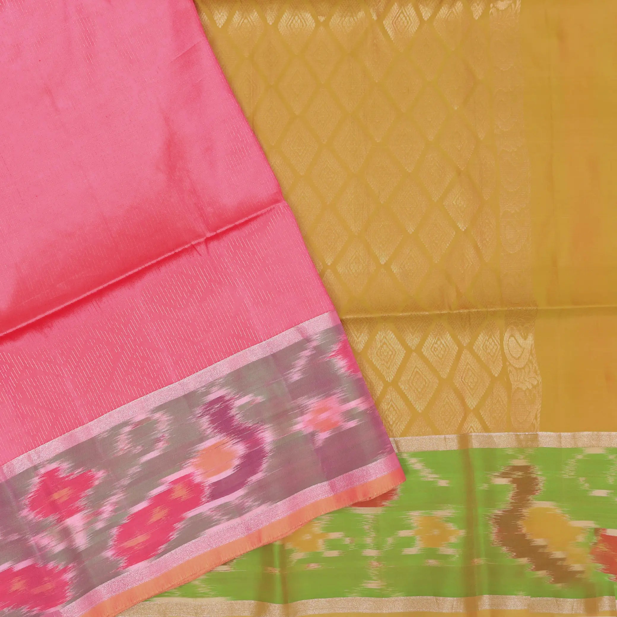 Pastel pink with mossy green Ikat border soft silk saree