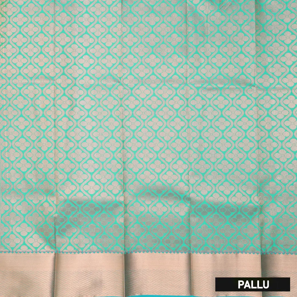 Vibrant Green with Blue Embossed Silk Saree