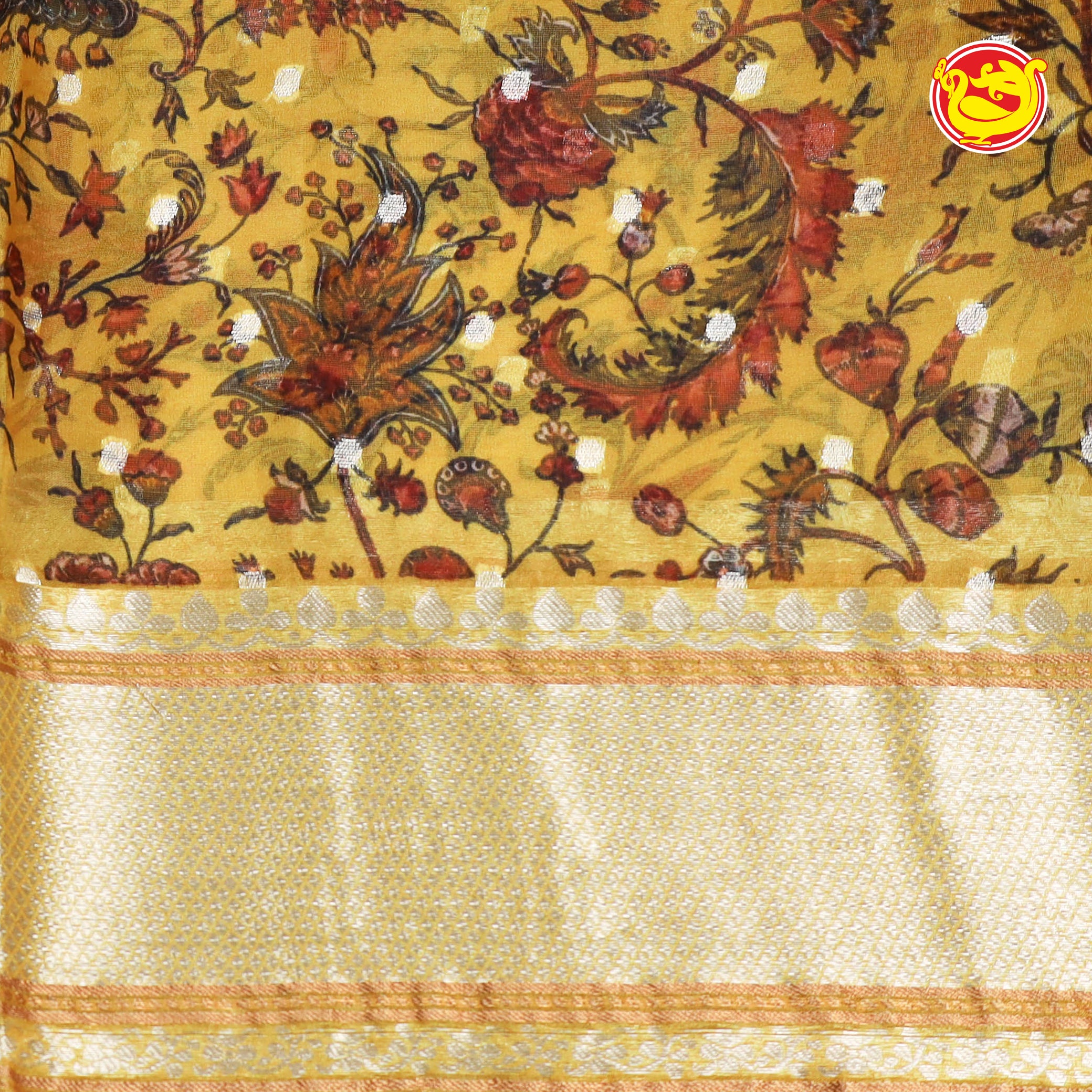 Yellow organza silk saree with floral embroidery and zari butta