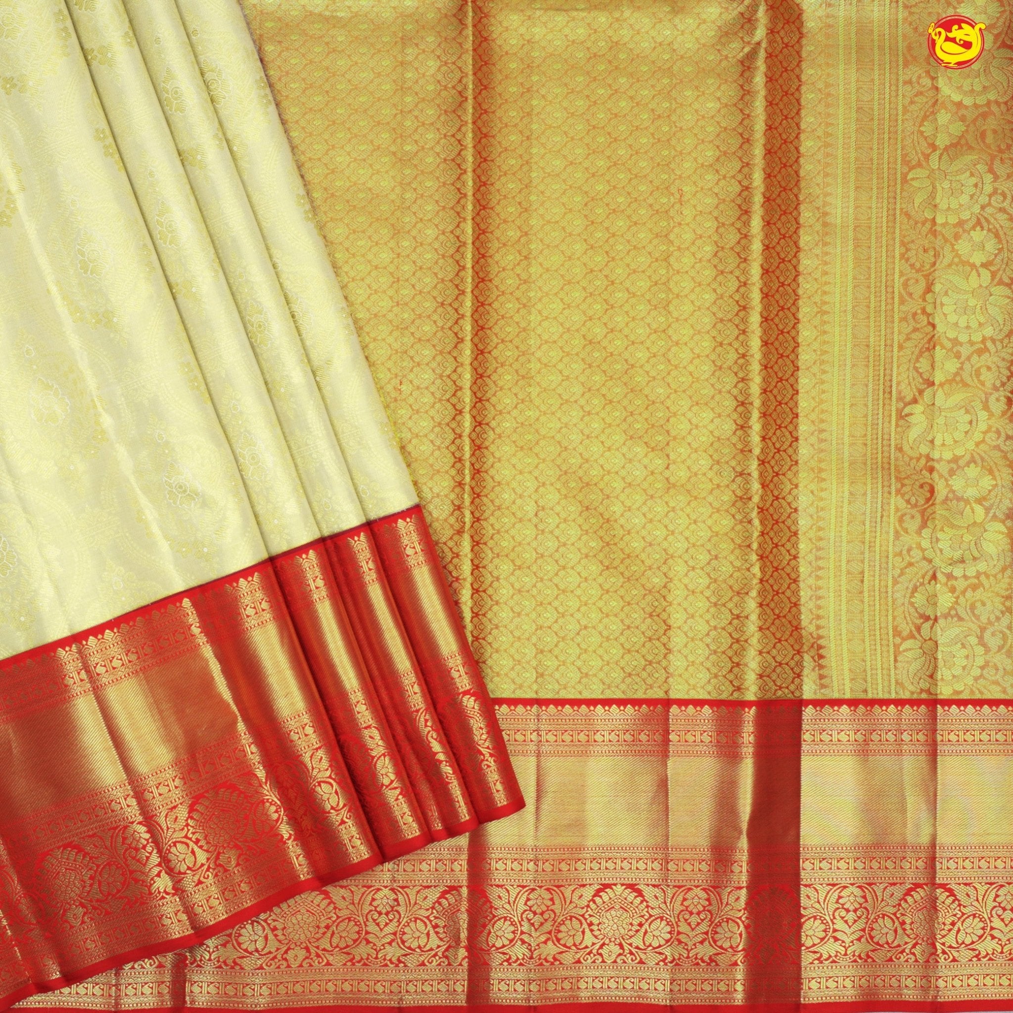 Cream with red wedding silk saree