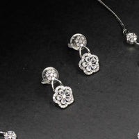 White stone necklace with matching earrings