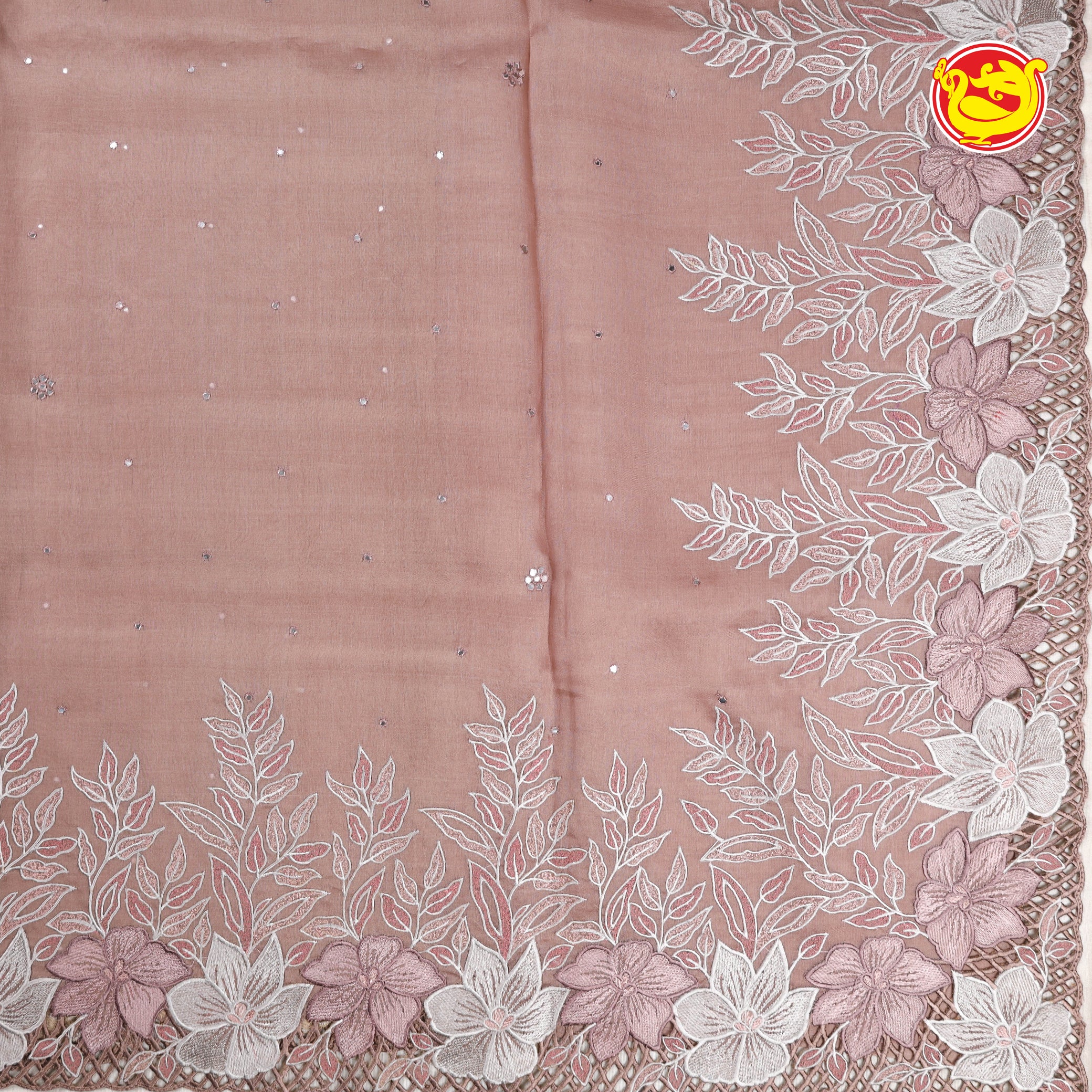 Light pastel brown pure organza silk saree with cut work and embroidery