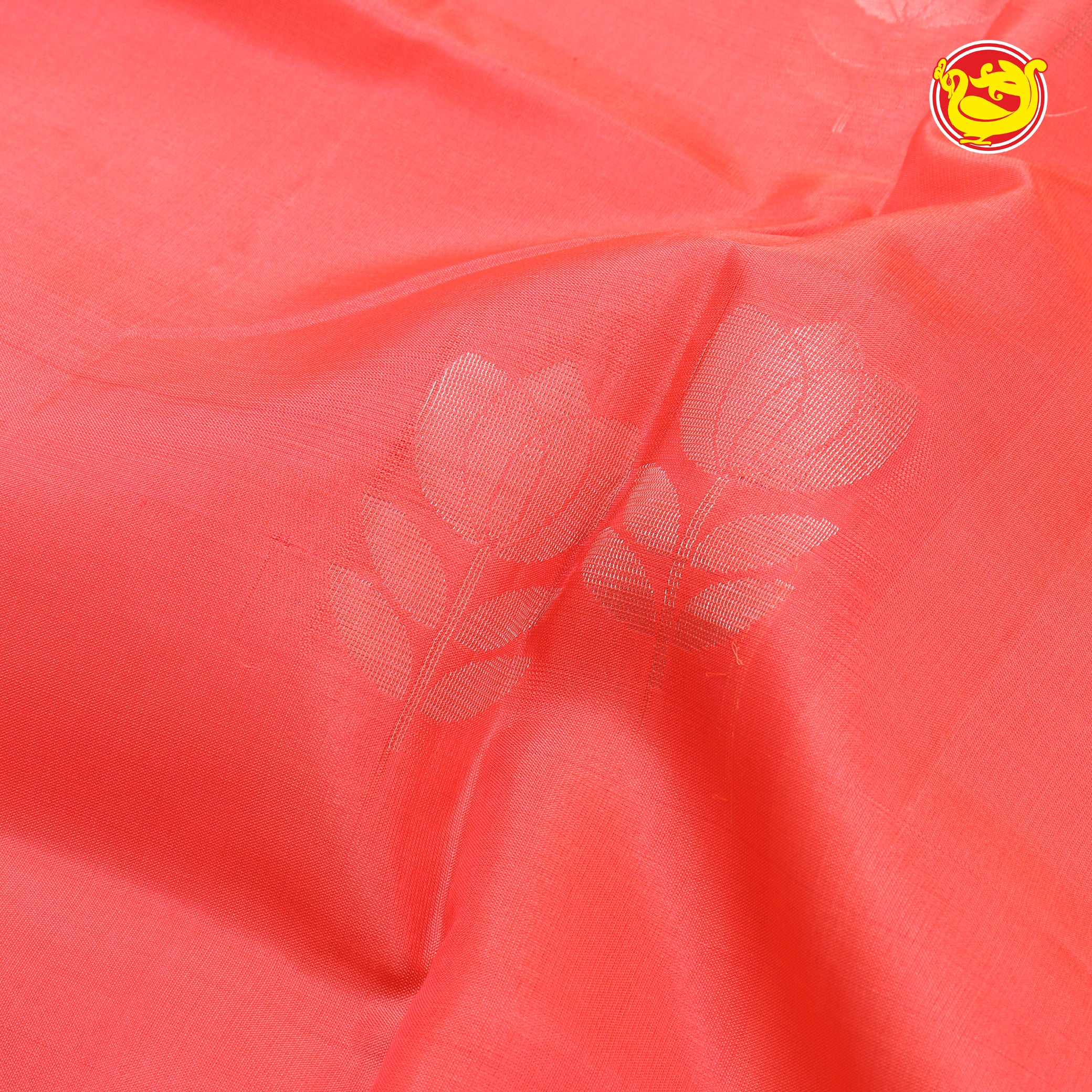 Orange with grey soft silk saree with floral motifs