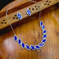 White and blue stones necklace and stud