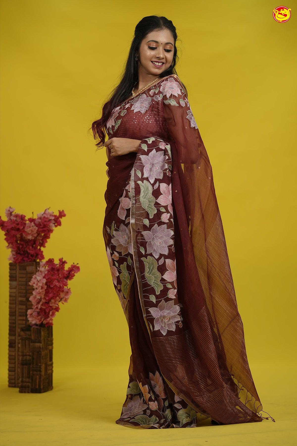 Maroon Pure organza silk with embroidered border and mirror work saree