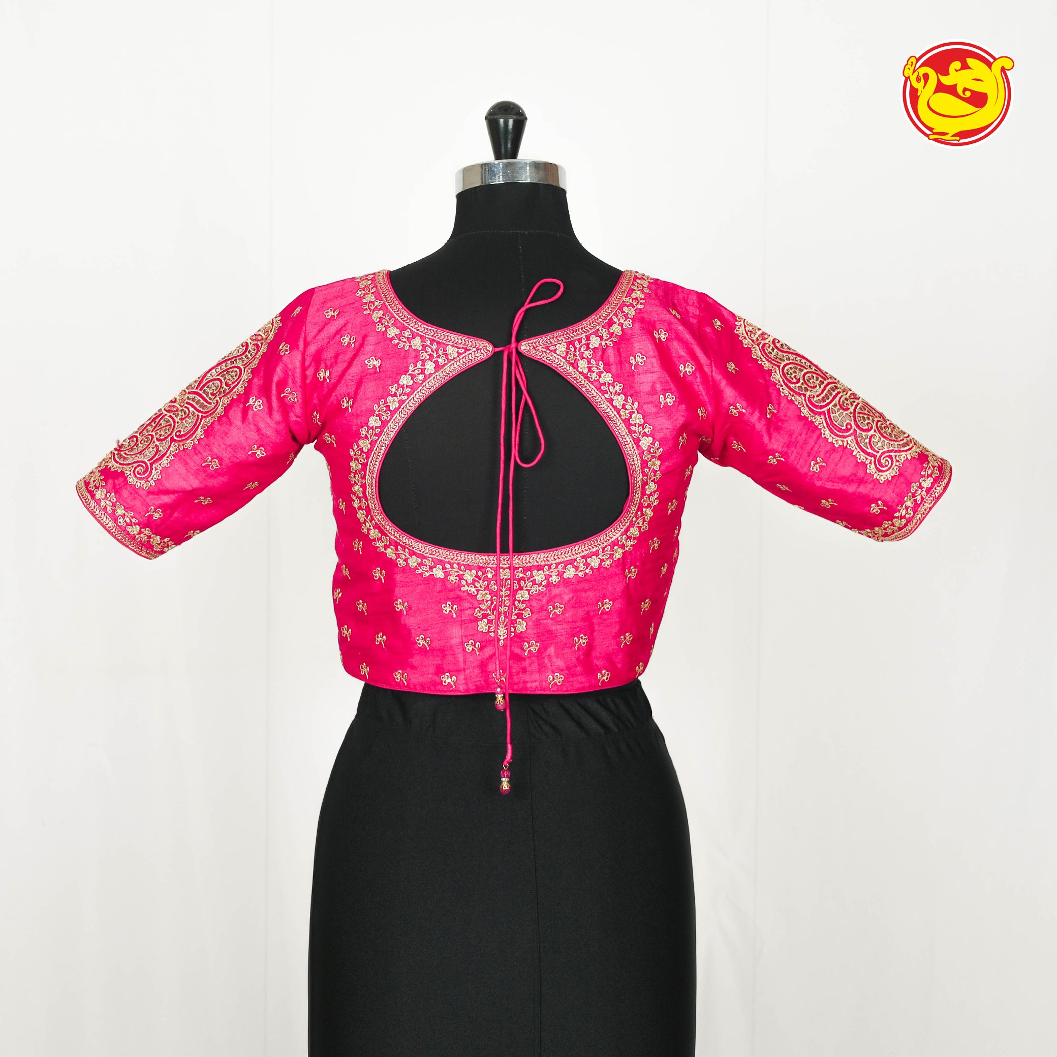 Pink Embroidered readymade blouse with cut work in sleeves