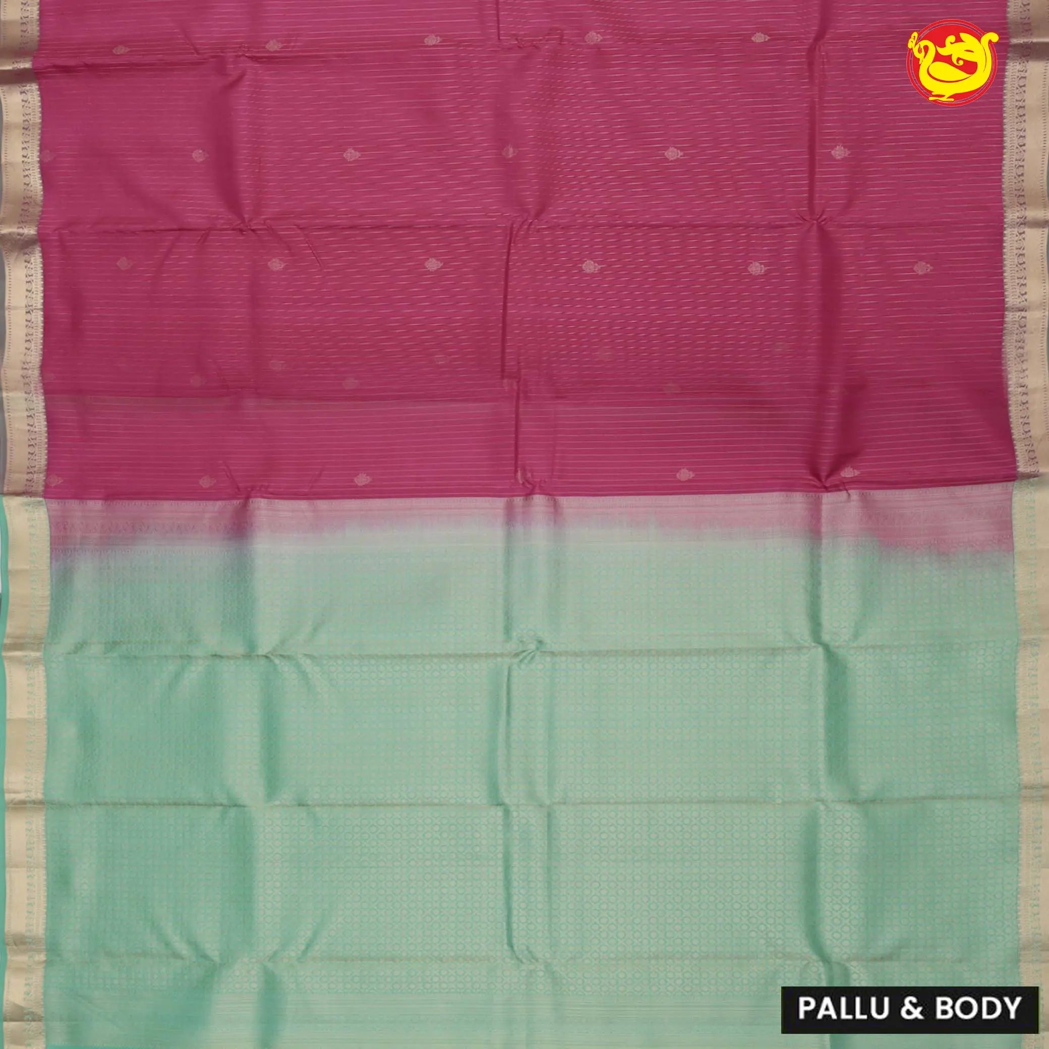 Magenta with pastel green soft silk saree with minimalistic border