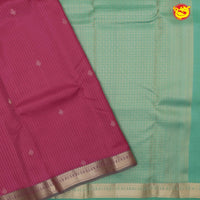 Magenta with pastel green soft silk saree with minimalistic border