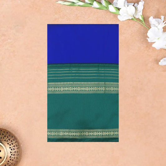 Royal Blue and Green, with accents of gold zari work. soft silk