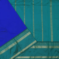 Royal Blue and Green, with accents of gold zari work. soft silk