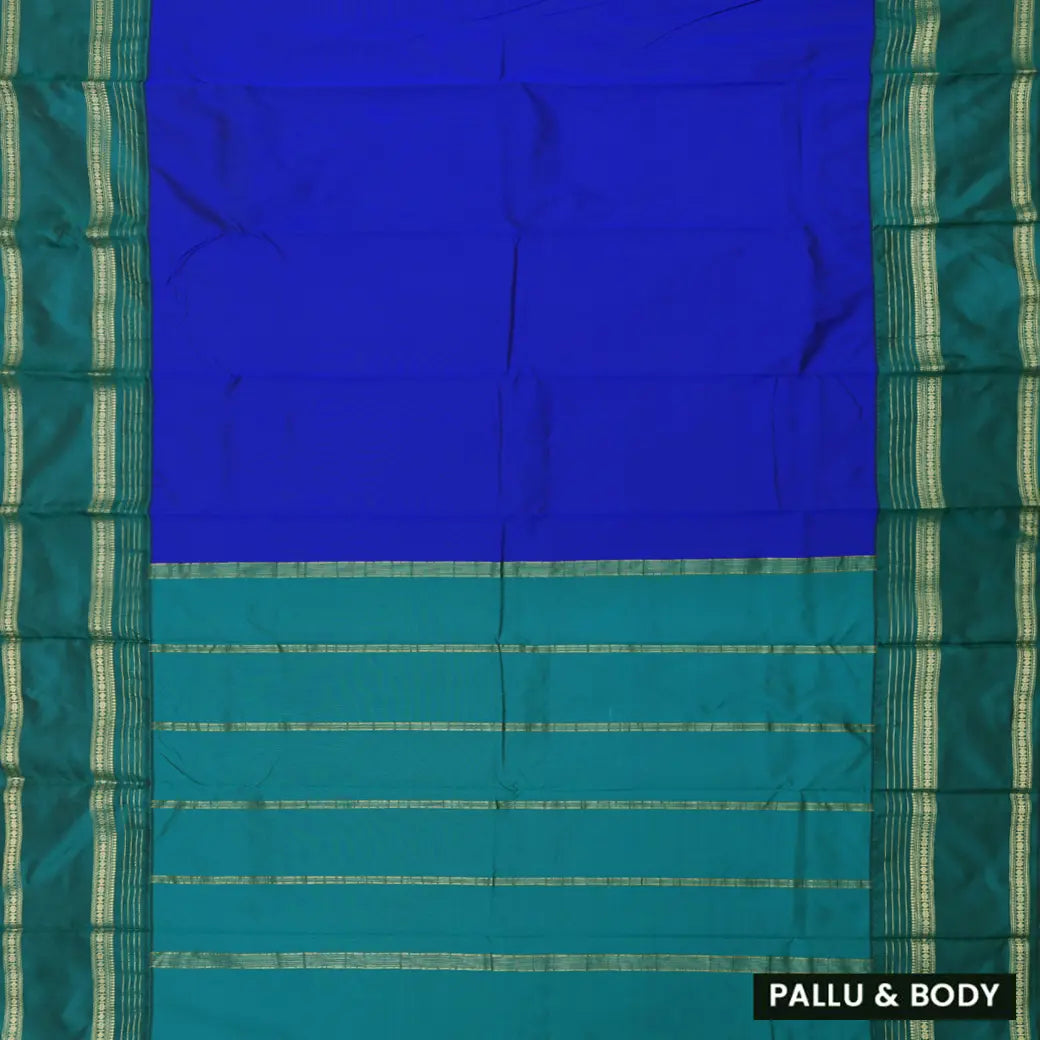 Royal Blue and Green, with accents of gold zari work. soft silk