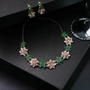 3D floral necklace with green stones and matching earrings
