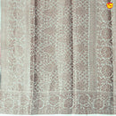 Unique Half White Chanderi Silk Saree with Floral Design and Copper Zari Border - Thenianantham