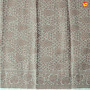 Unique Half White Chanderi Silk Saree with Floral Design and Copper Zari Border - Thenianantham