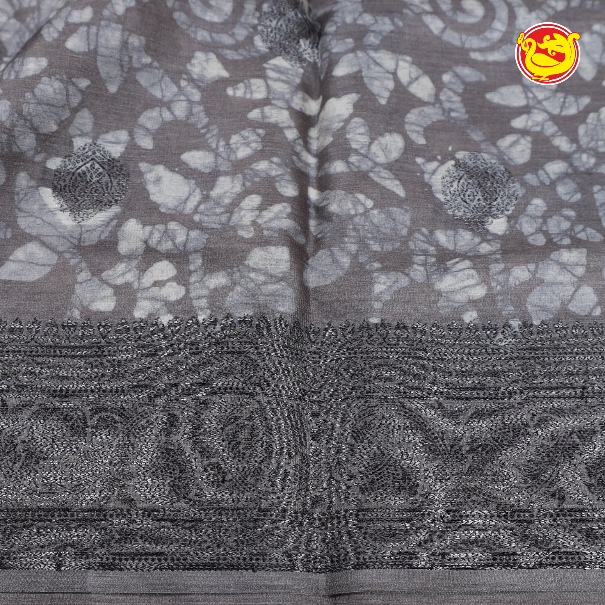 Grey pure tussar saree with batik prints