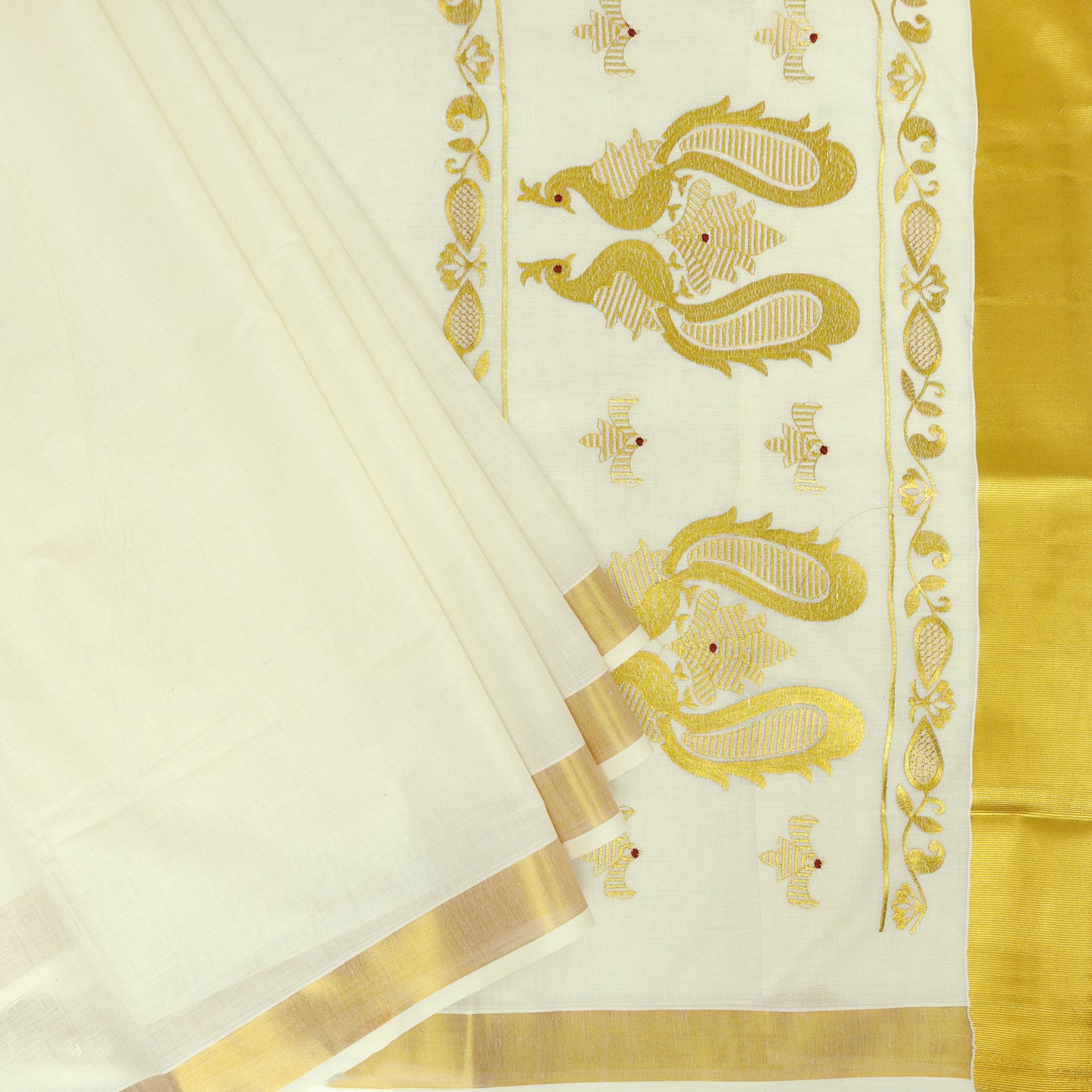 Off White With Golden Silk Threaded Peacock Embroidery  traditional kerala onam saree