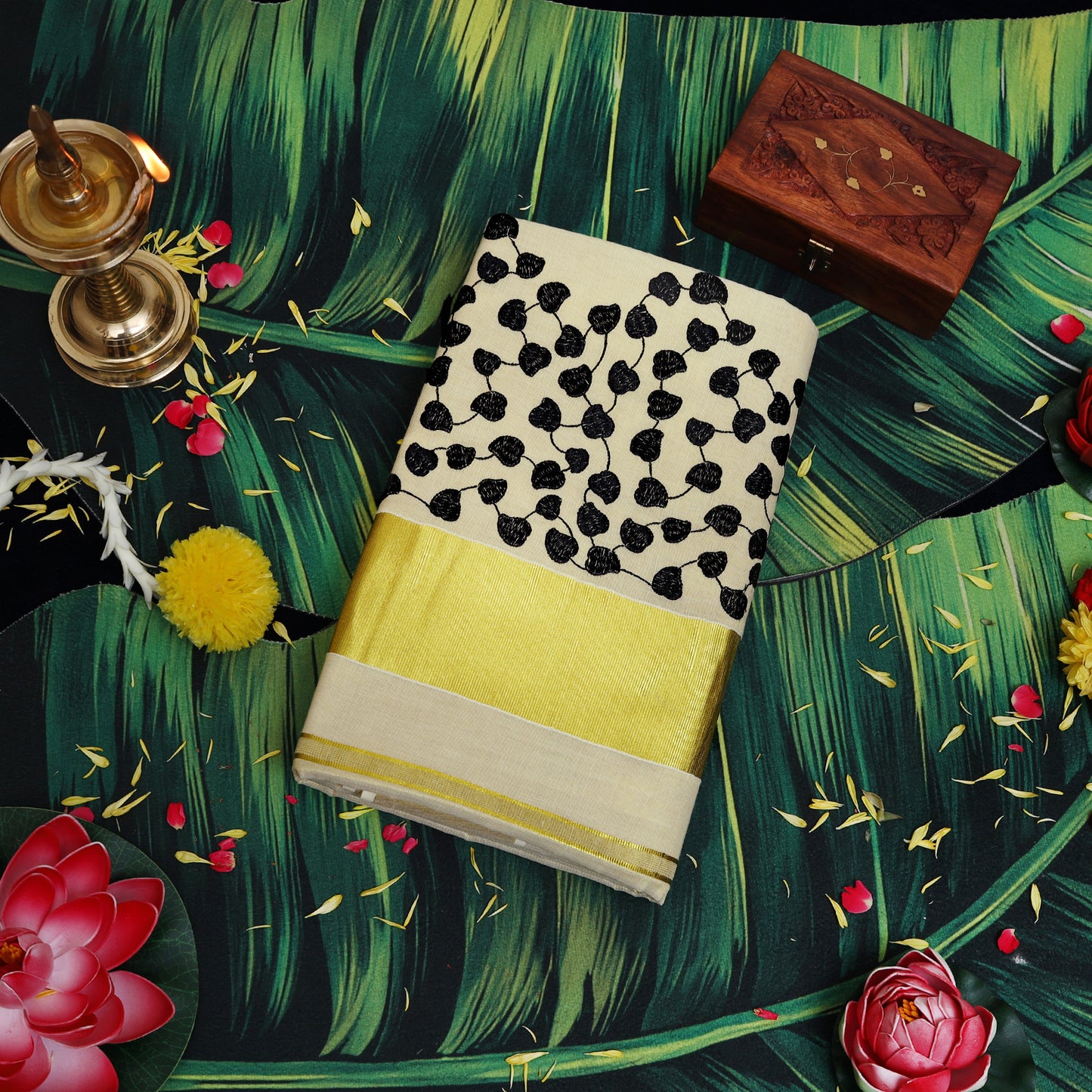 Off White With Black Leaf Cluster Motifs Embroidery  traditional kerala onam saree