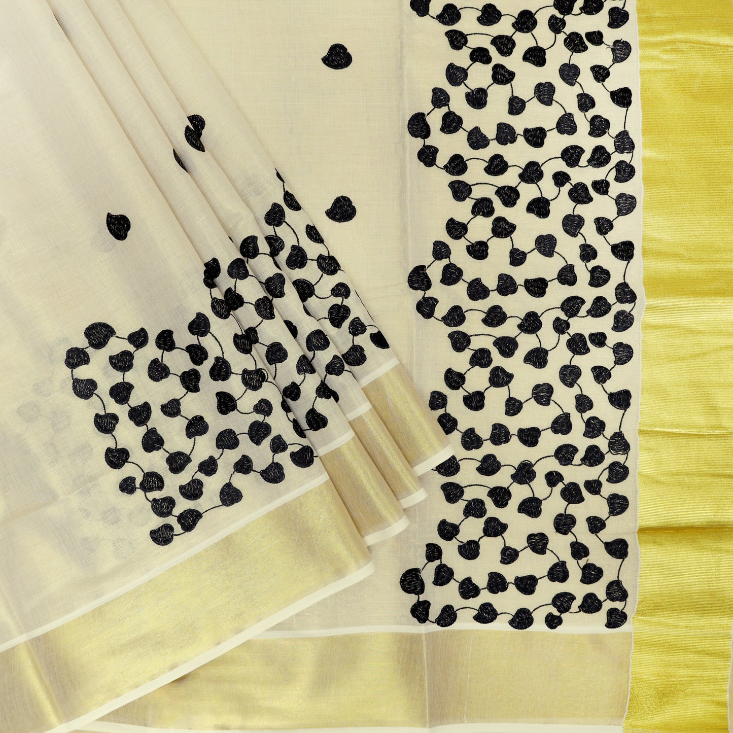 Off White With Black Leaf Cluster Motifs Embroidery  traditional kerala onam saree