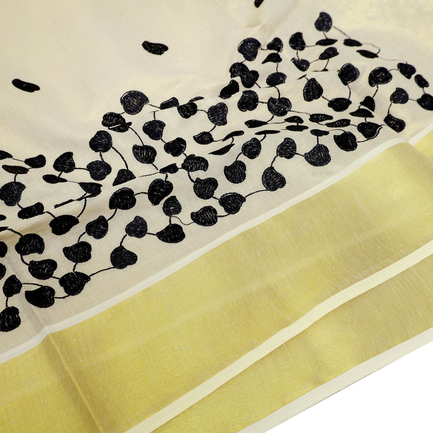 Off White With Black Leaf Cluster Motifs Embroidery  traditional kerala onam saree