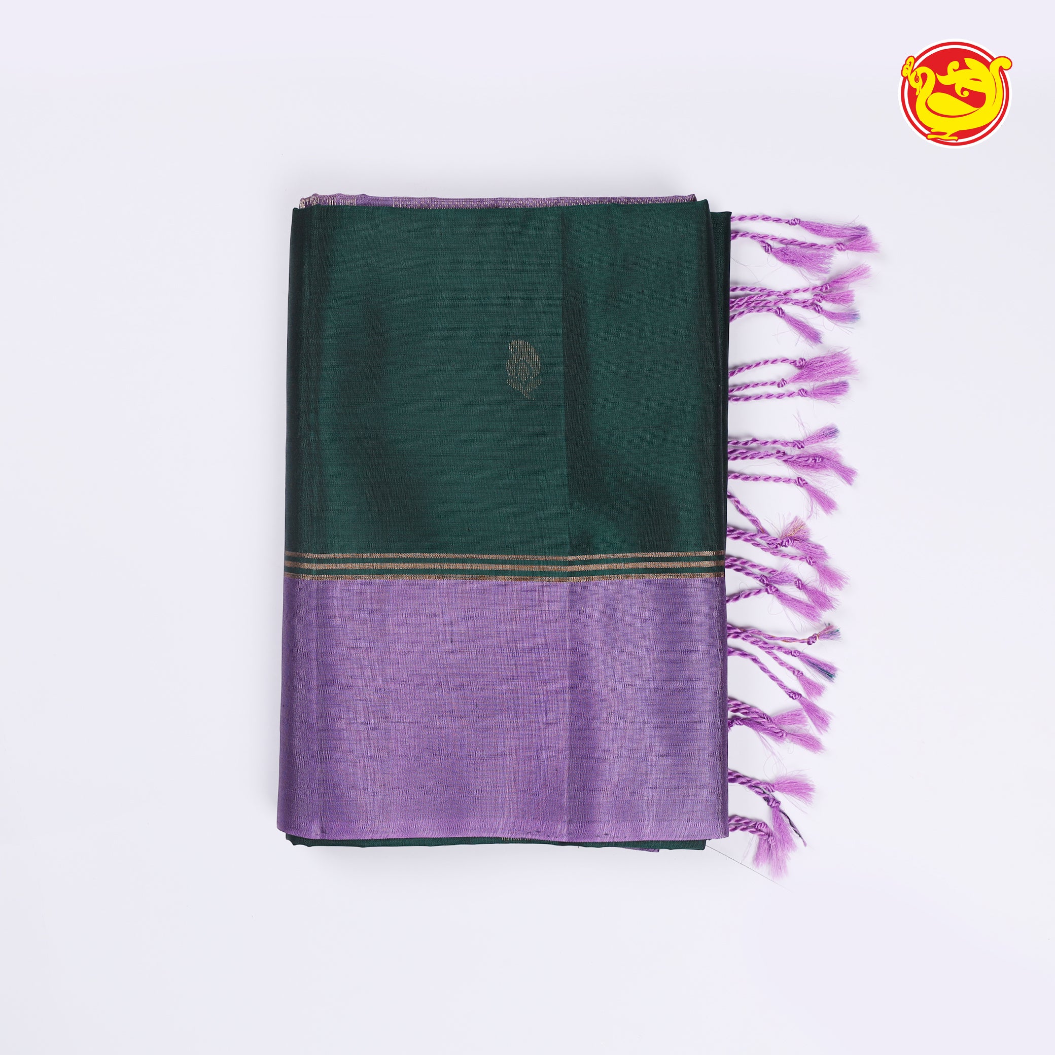 Bottle green soft silk saree with purple pallu