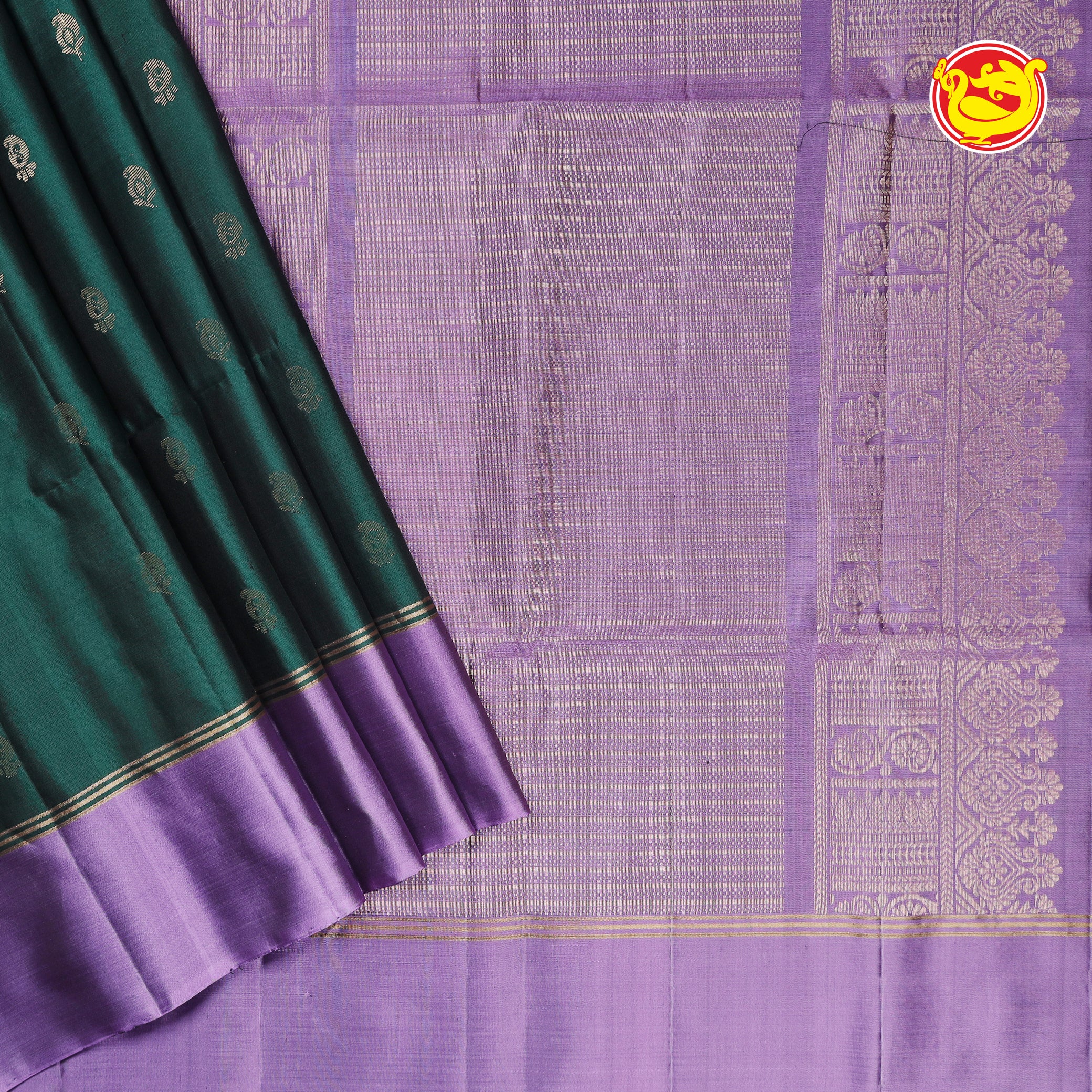 Bottle green soft silk saree with purple pallu