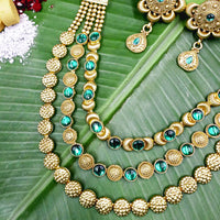 Layered necklace with green Kundan stones with matching earrings