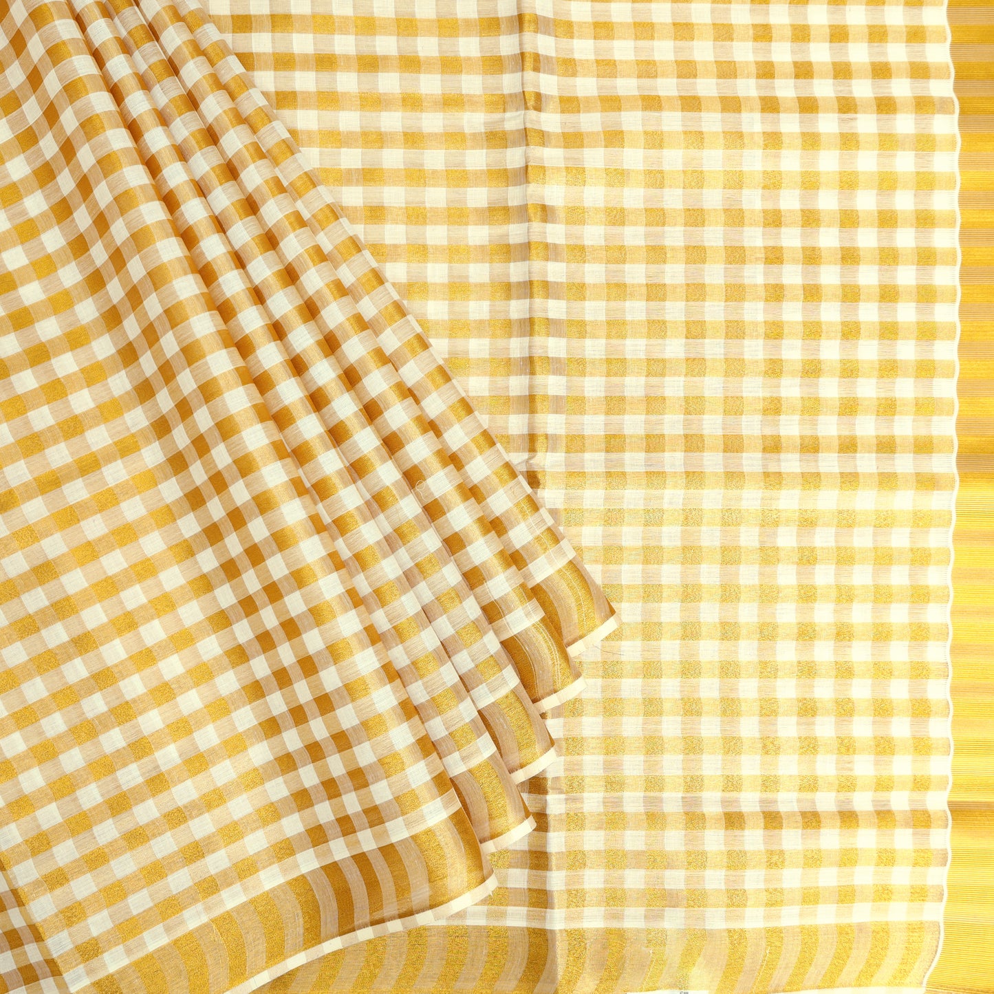 Off White With Golden Checked traditional kerala onam saree