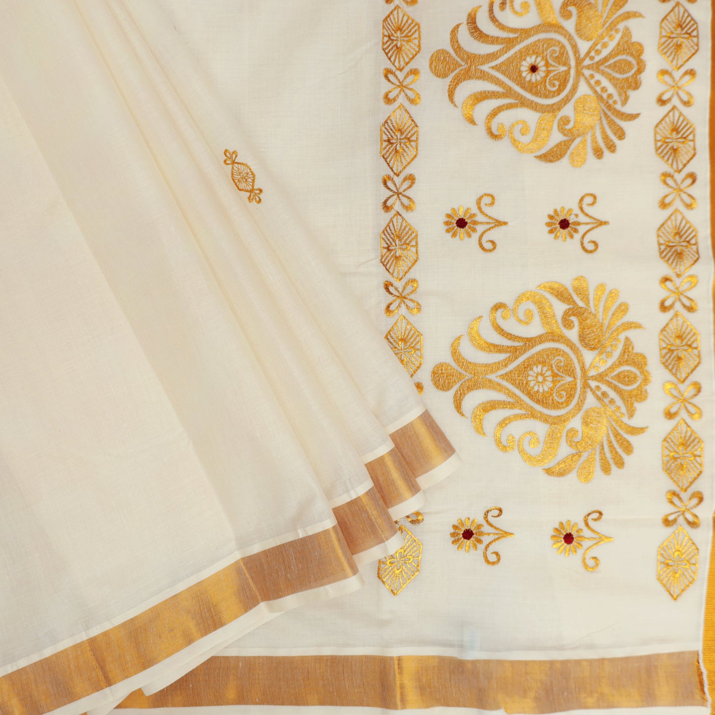 Off White With Golden Floral Cross Buttas Embroidery  traditional kerala onam saree
