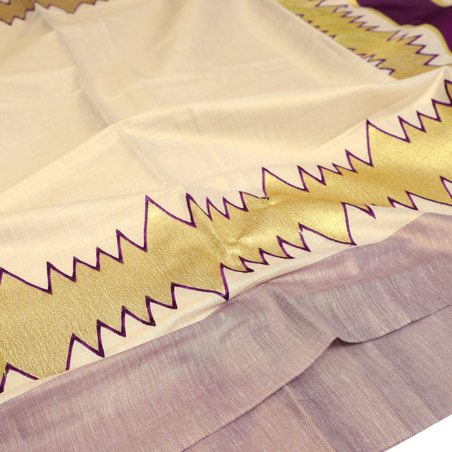 Off White With Purple Sharp Geometric Zip-Zag Lines Stitched Over Wide Gold traditional kerala onam saree